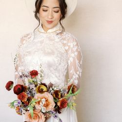 Fleurisse Design - Bride in modern ao dai with bridal bouquet