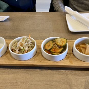 Ziggle - Side dishes (left to right): potato salad, bean sprouts, cucumbers, radish - Korean Near Me - Flushing, New York