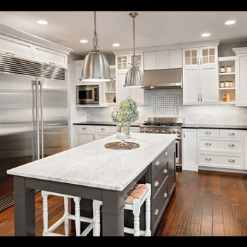Empire Countertops - kitchen with stainless steel appliances - General Contractors Near Me - Austin, Texas