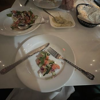 Selda - The beautiful salad and fresh bread along with an eggplant appetizer! - Mediterranean Near Me - Irving, Texas