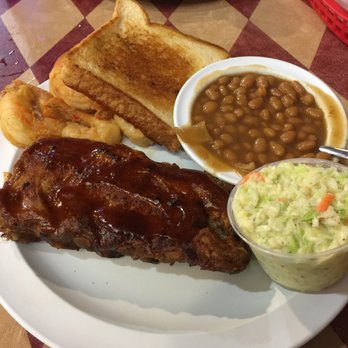 The Log Cabin BBQ - 1/2 baby back ribs and shrimps with Texas toast, baked beans and coleslaw! - Barbeque Near Me - Labelle, Florida The Log Cabin BBQ - 1/2 baby back ribs and shrimps with Texas toast, baked beans and coleslaw! - Barbeque Near Me - Labelle, Florida
