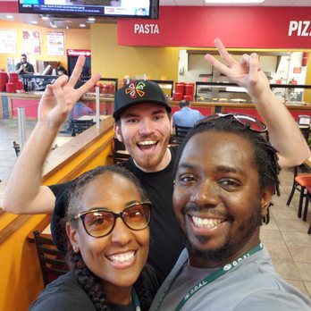 Cicis Pizza - This is Chris the very cool Cicis magician and my husband and I. - Pizza Near Me - Davenport, Florida