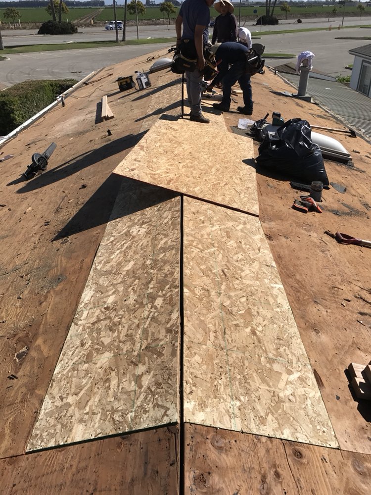 Slide of Espino Roofing