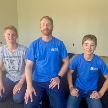 Curtis Flooring - More than flooring - its family. Owner Kyle with his sons helping on an install over the summer. - Flooring Near Me - Philomath, Oregon Curtis Flooring - More than flooring - its family. Owner Kyle with his sons helping on an install over the summer. - Flooring Near Me - Philomath, Oregon
