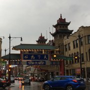 Photo of Moon Palace Express - Chicago, IL, United States. Chinatown Gate on a blustery night.
