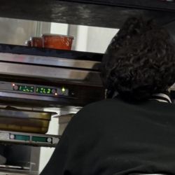 Popeyes Louisiana Kitchen - The worker who was on her phone and ignored me