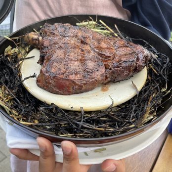 Wit & Wisdom Sonoma - 32 OZ HAY-SMOKED BONE-IN RIBEYE (4/5) - New American Near Me - Sonoma, California Wit & Wisdom Sonoma - 32 OZ HAY-SMOKED BONE-IN RIBEYE (4/5) - New American Near Me - Sonoma, California