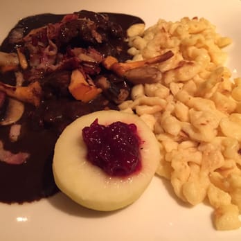 Restaurant Rebstock - It's the season now! Game meat with spatzli, baked apple with cranberry. Tender juicy meat with pepper sauce - Swiss Food Near Me - Thalwil, ZH Restaurant Rebstock - It's the season now! Game meat with spatzli, baked apple with cranberry. Tender juicy meat with pepper sauce - Swiss Food Near Me - Thalwil, ZH