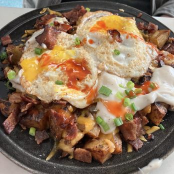 Fork N Spoon - Bowl with hash browns, bacon, gravy, eggs. - Breakfast & Brunch Near Me - Baton Rouge, Louisiana Fork N Spoon - Bowl with hash browns, bacon, gravy, eggs. - Breakfast & Brunch Near Me - Baton Rouge, Louisiana