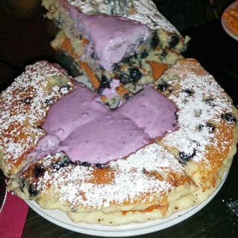 The Griddle Cafe - BLUESberry pancake Whole blueberry in every bite! Topped with blueberry sour cream and powdered sugar - Breakfast & Brunch Near Me - Los Angeles, California The Griddle Cafe - BLUESberry pancake Whole blueberry in every bite! Topped with blueberry sour cream and powdered sugar - Breakfast & Brunch Near Me - Los Angeles, California