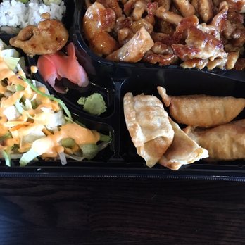 Sumiyaki Japan - Chicken Bento box, chicken on top of white rice with fried dumplings - Japanese Near Me - Metuchen, New Jersey Sumiyaki Japan - Chicken Bento box, chicken on top of white rice with fried dumplings - Japanese Near Me - Metuchen, New Jersey