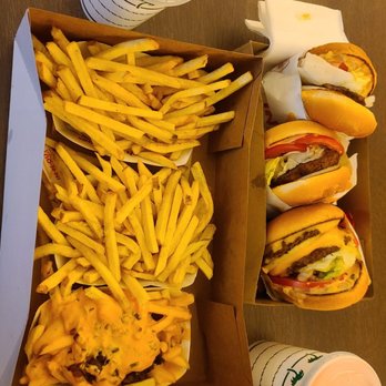 In-N-Out Burger - Animal Fries, two regular fries, one double double, two hamburgers, strawberry milkshake, and chocolate milkshake - Burgers Near Me - Keizer, Oregon