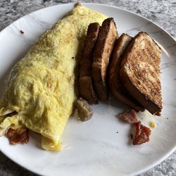 Meme’s Diner - Everything omelette with pumpkin toast!