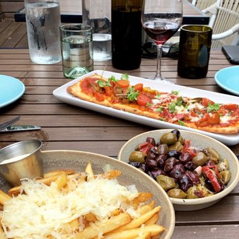 Copper Vine Inn - Duck fat fries, olives, and vegetable flatbread - Wine Bars Near Me - New Orleans, Louisiana