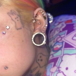 House Of Colour Tattoo - Dermal piercing & triple helix