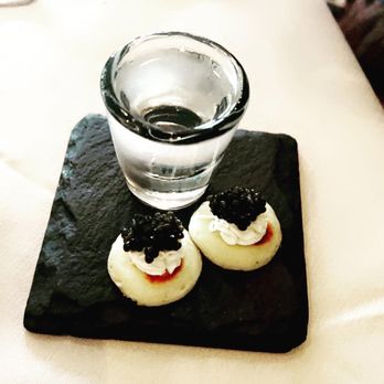 Paris 7th - a glass of water and a small dessert - French Near Me - Fort Worth, Texas