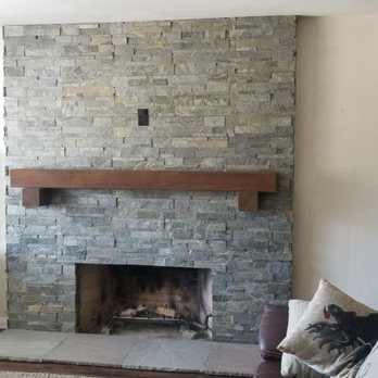 C Tan Construction - Fireplace remodel. Stacked stone with redwood mantel. - General Contractors Near Me