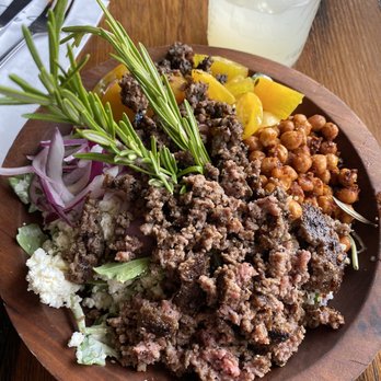 The Russell - The Russell Bowl - ground brisket, quinoa, arugula, red onion, cherry tomatoes, garbanzo beans, olives, feta cheese - Salad Near Me - Kansas City, Missouri The Russell - The Russell Bowl - ground brisket, quinoa, arugula, red onion, cherry tomatoes, garbanzo beans, olives, feta cheese - Salad Near Me - Kansas City, Missouri
