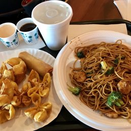 a plate of noodles and a cup of coffee a plate of noodles and a cup of coffee