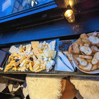 Ophelia - Cheese plate with sliced baguette - Cocktail Bars Near Me - New York, New York Ophelia - Cheese plate with sliced baguette - Cocktail Bars Near Me - New York, New York