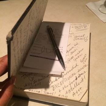 Second Story Restaurant - It is super cool how they bring you the check!!!  Inside a book.  Love it. - New American Near Me - Manhattan Beach, California