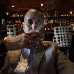 Churchill's Fine Cigars - Checkout the fully stocked bar behind me..
