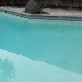 Desert Glass Pools - Before view 1 - Pool Cleaners Near Me