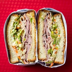 Bill’s Sandwich Palace - CAESAR CLUB--Boar's Head tavern ham, oven gold turkey, romaine slaw, tomato, parm, buttermilk bacon caesar dressing, garlic butter toast