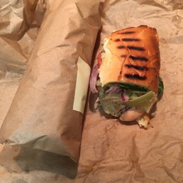My chicken artichoke sandwich with spinach onion pepper Cheaneys and extra sauce on it My chicken artichoke sandwich with spinach onion pepper Cheaneys and extra sauce on it