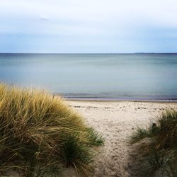 Dat Stranddörp - Aussicht durch die Dünen auf die Ostsee