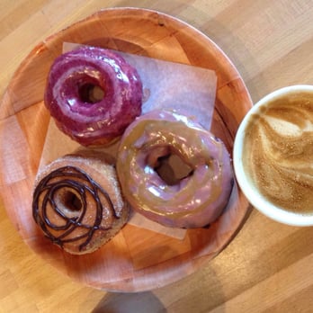 Vortex Doughnuts - Lemon blueberry, caramel cherry on chocolate cake, the vortex (cinnamon sugar with chocolate glaze). - Coffee & Tea Near Me - Asheville, North Carolina Vortex Doughnuts - Lemon blueberry, caramel cherry on chocolate cake, the vortex (cinnamon sugar with chocolate glaze). - Coffee & Tea Near Me - Asheville, North Carolina