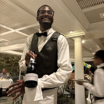 Commander's Palace - Our guy Johnny presents our wine - Cajun/Creole Near Me - New Orleans, Louisiana