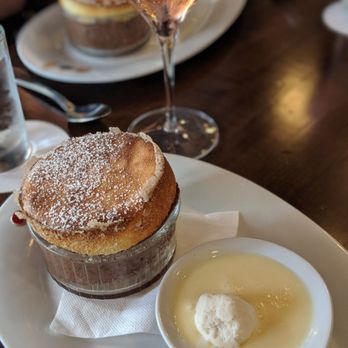 Maison Pucha Bistro - Chocolate passion fruit souffle - French Near Me - Houston, Texas Maison Pucha Bistro - Chocolate passion fruit souffle - French Near Me - Houston, Texas