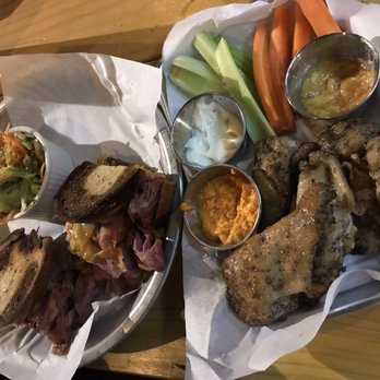 Watershed - Delicious Smoked Ruben and smoked Chicken wings with house made sauces on the side - German Near Me - Houston, Texas