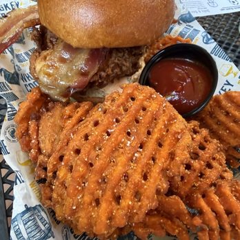 The Whiskey Coop - The Competition - fried chicken over pimento cheese, bacon, & hot honey drizzle. Upgraded sweet fries & LOVED that they were salted. - Whiskey Bars Near Me - Watertown, New York The Whiskey Coop - The Competition - fried chicken over pimento cheese, bacon, & hot honey drizzle. Upgraded sweet fries & LOVED that they were salted. - Whiskey Bars Near Me - Watertown, New York