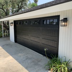 Gilmore Garage Doors - Black doors on a white house looks nice.