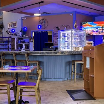 Embrace - the inside of a restaurant with tables and chairs - Waffles Near Me - Sicklerville, New Jersey