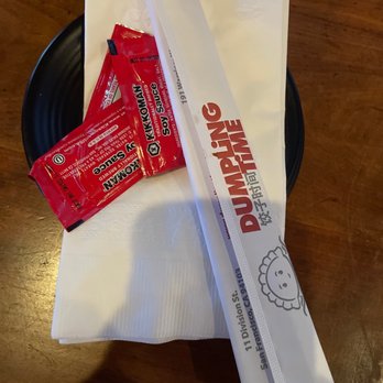 Dumpling Time - Plate with napkins and chopsticks with their logo - Dim Sum Near Me - San Francisco, California Dumpling Time - Plate with napkins and chopsticks with their logo - Dim Sum Near Me - San Francisco, California