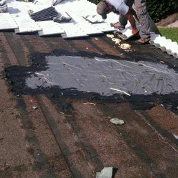 Here is a photo of the tarp code red put on my roof with tar and then put the tiles back over it.