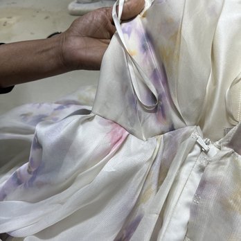 Capriani's Tailors - The atrocious hack job on the waist of my gown, that was symmetrical when I dropped it off. - Sewing & Alterations Near Me - New York, New York