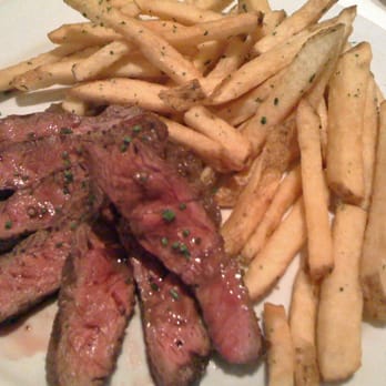 Roots Restaurant - Flat iron steak with hand cut French fries. - New American Near Me - San Francisco, California
