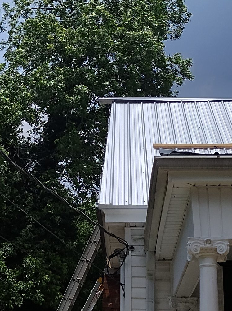 Slide of Platinum Roofing