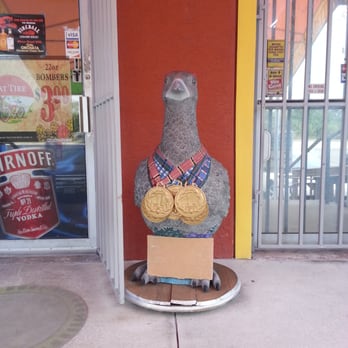 Punta Gorda Discount Liquors - a statue of a bear - Beer, Wine & Spirits Near Me - Punta Gorda, Florida Punta Gorda Discount Liquors - a statue of a bear - Beer, Wine & Spirits Near Me - Punta Gorda, Florida