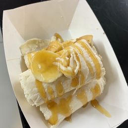 Half of banana pudding and wafers rolled ice cream. Half of banana pudding and wafers rolled ice cream.