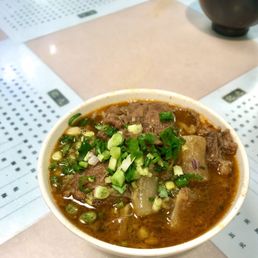 Curry beef tendon brisket with flat rice noodles