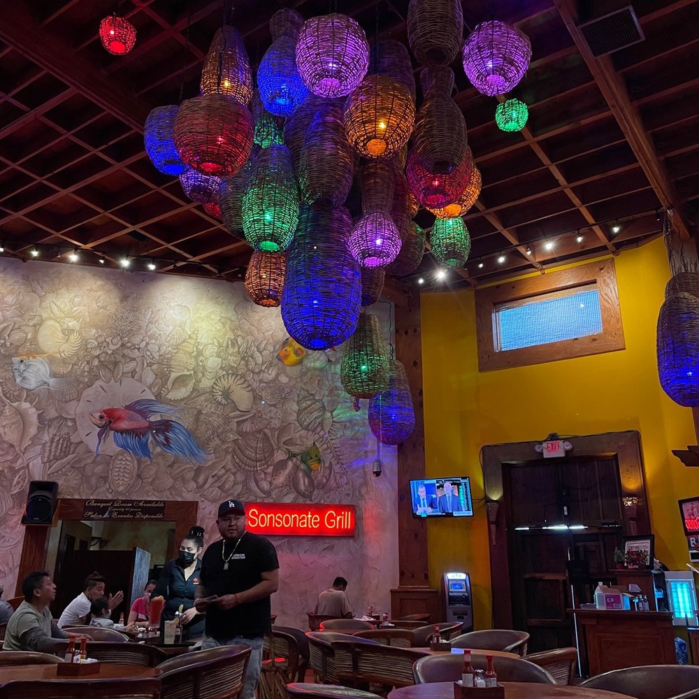 a restaurant with colorful lights