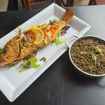 Djon Djon - Red snapper + black rice - Haitian Near Me - New York, New York Djon Djon - Red snapper + black rice - Haitian Near Me - New York, New York