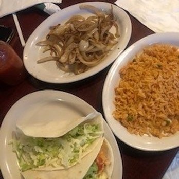 Mango's Mexican Restaurant - a la carte of chicken soft tacos (before they got all soggy), rice, onions - Mexican Near Me - Louisville, Kentucky Mango's Mexican Restaurant - a la carte of chicken soft tacos (before they got all soggy), rice, onions - Mexican Near Me - Louisville, Kentucky
