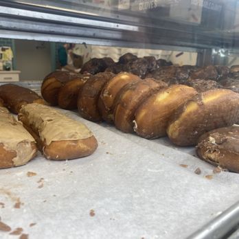 St. George’s Donuts - Maple-iced long-johns and chocolate-iced donuts with angel cream. - Donuts Near Me - Springfield, Missouri
