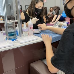 My daughter getting her nails done My daughter getting her nails done